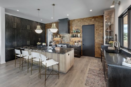 Kitchen with wood flooring, natural finishes, and warm tones inspired by the Texas Hill Country environment
