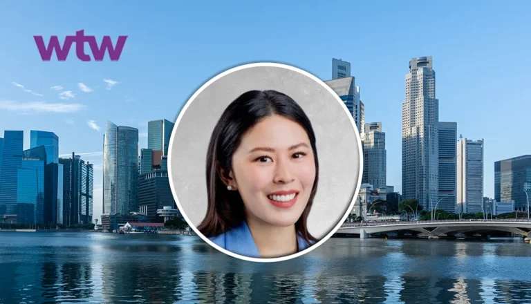Smiling woman’s headshot in a circular frame over a city skyline with water in the foreground and a purple WTW logo in the top-left.
