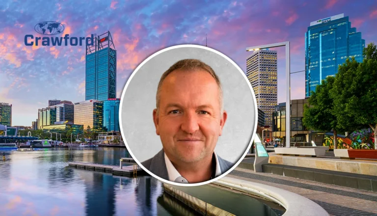 Crawford banner: sunset cityscape with tall glass buildings and a circular portrait of a smiling man in the foreground