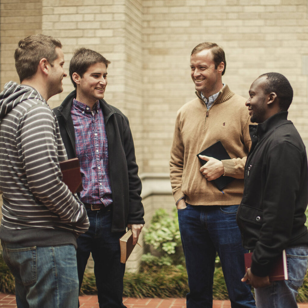 A group of men chatting