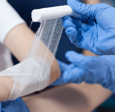 closeup african american pediatrician doctor bandage fractured injured arm 1