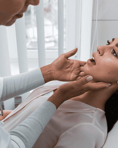 doctor checking patient s mouth 1