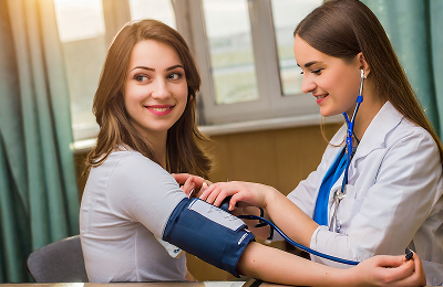 doctor measures pressure patients his neck with 1