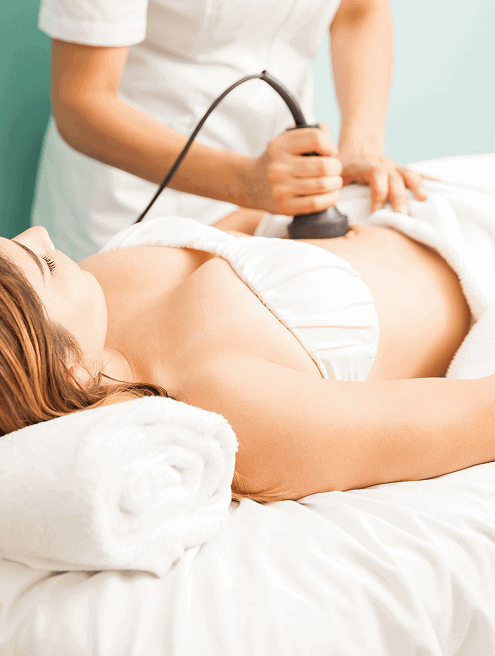 female therapist giving reductive reaffirming treatment client focusing her belly 1 1