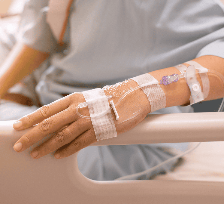 hands patient woman receiving saline solution sitting sick bed hospital 1
