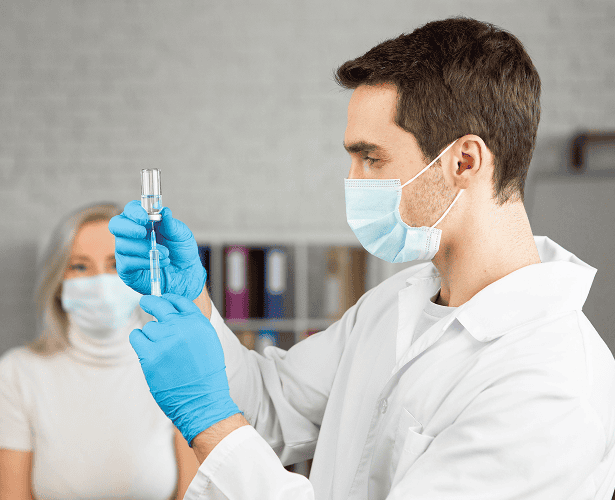 medium shot doctor wearing mask 1