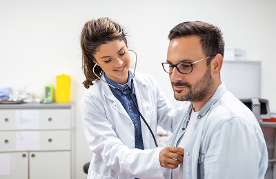 young doctor is using stethoscope listen heartbeat patient shot female doctor giving male patient check up 1