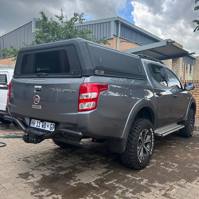 High-quality stainless steel canopy for Ford T6.2 Wildtrak, durable outdoor truck canopy, custom-fit vehicle accessories, RLD Design South Africa.