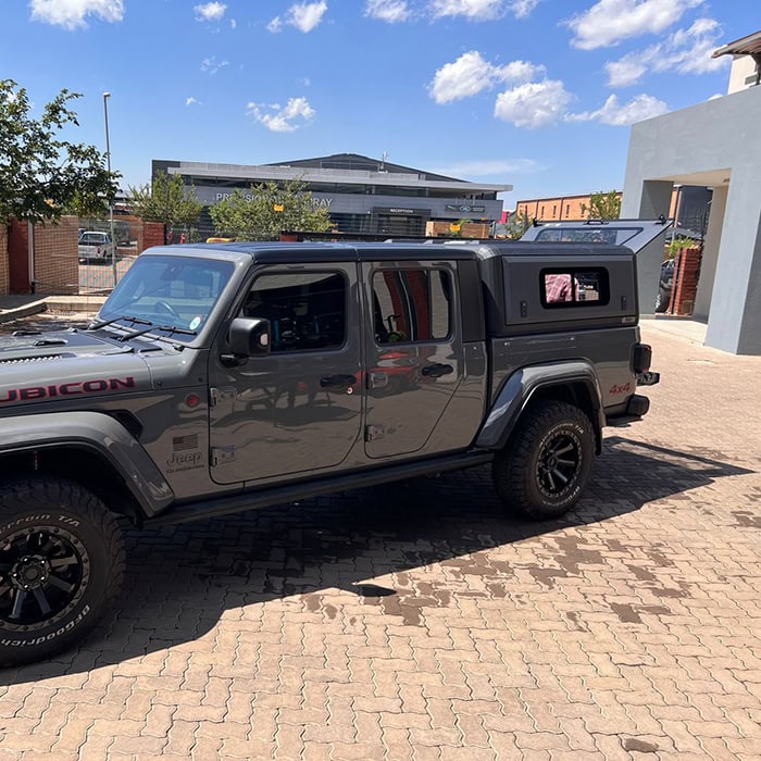 Durable stainless steel canopies for Jeeps and trucks, custom-designed to enhance vehicle style and protect accessories, ideal for off-road adventures and outdoor use.