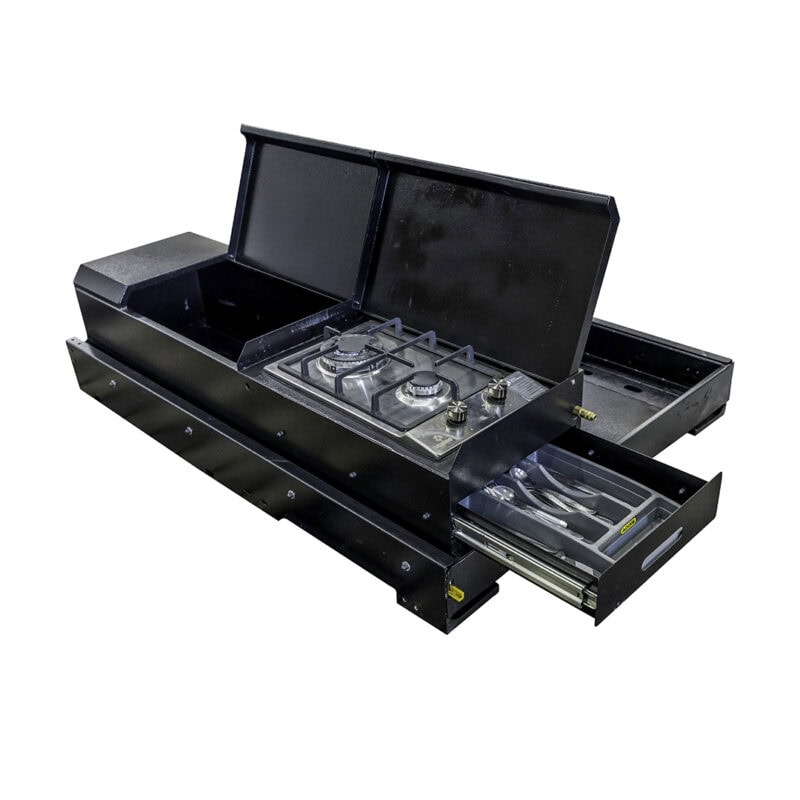 Portable black camping kitchen with two-burner stove, storage compartment, and cutlery drawer.