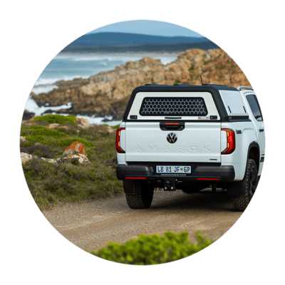High-quality stainless steel canopy on a Volkswagen Amarok pickup truck, designed for durability and style. Perfect for outdoor and off-road use.