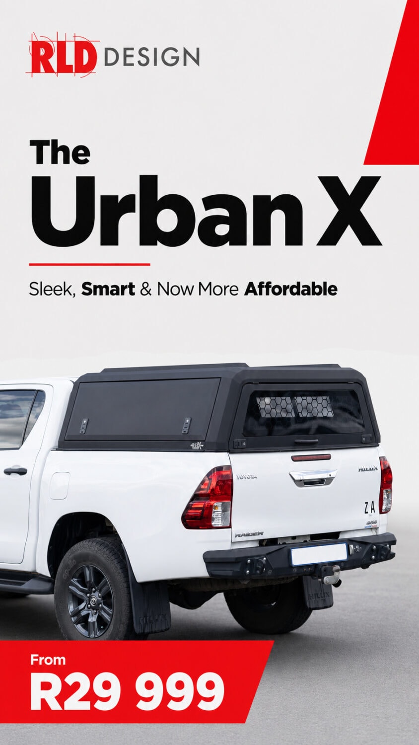 Modern stainless steel canopies by RLD Design, enhancing vehicle protection and style, featured on a white pickup truck in a sleek urban setting.