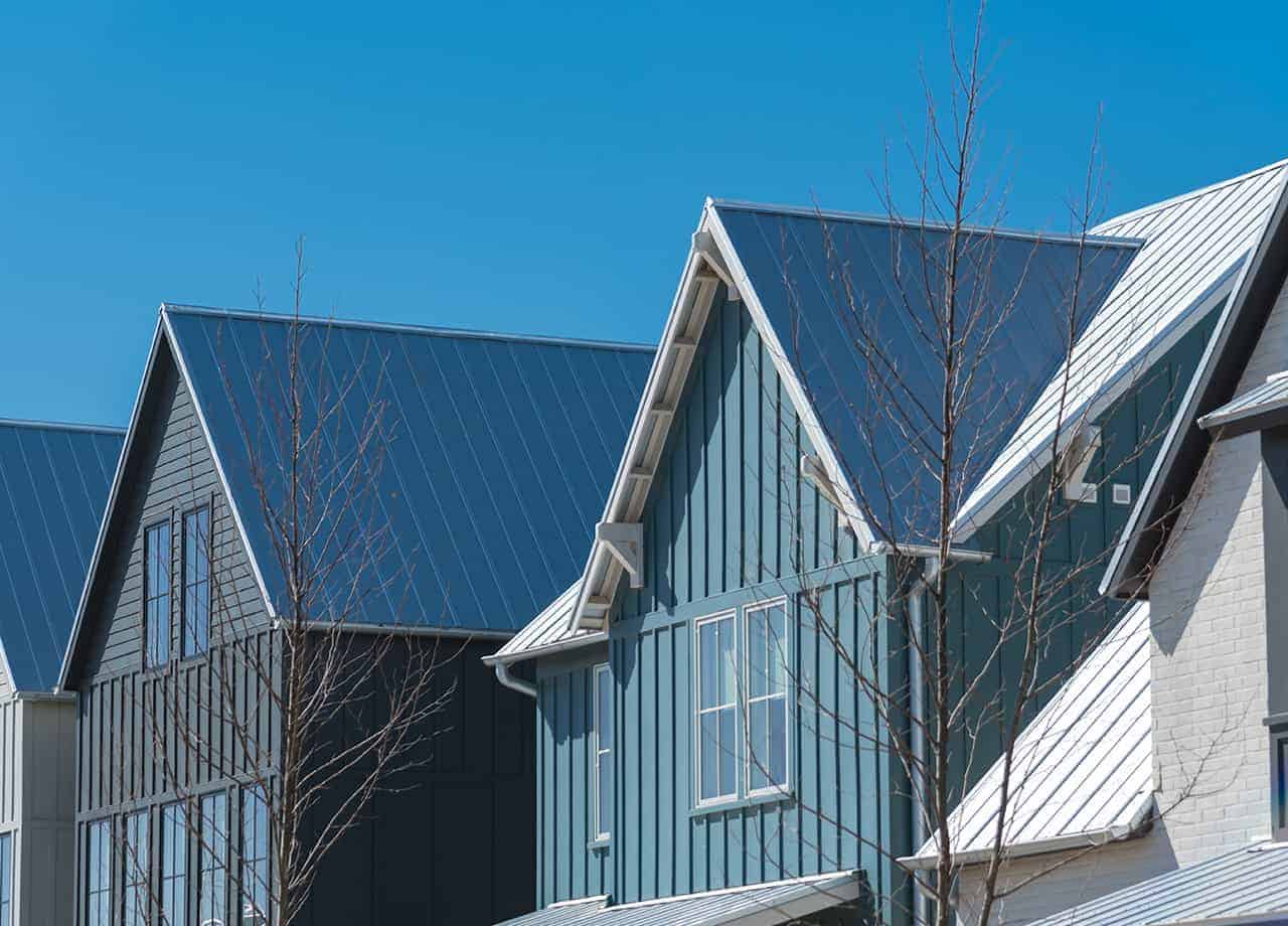 Metal Siding Milford OH _ Cincinnati OH Close up image of the second story of homes with metal siding in Milford OH. Roofing For Troops are metal siding experts in the Milford OH & Cincinnati OH areas.