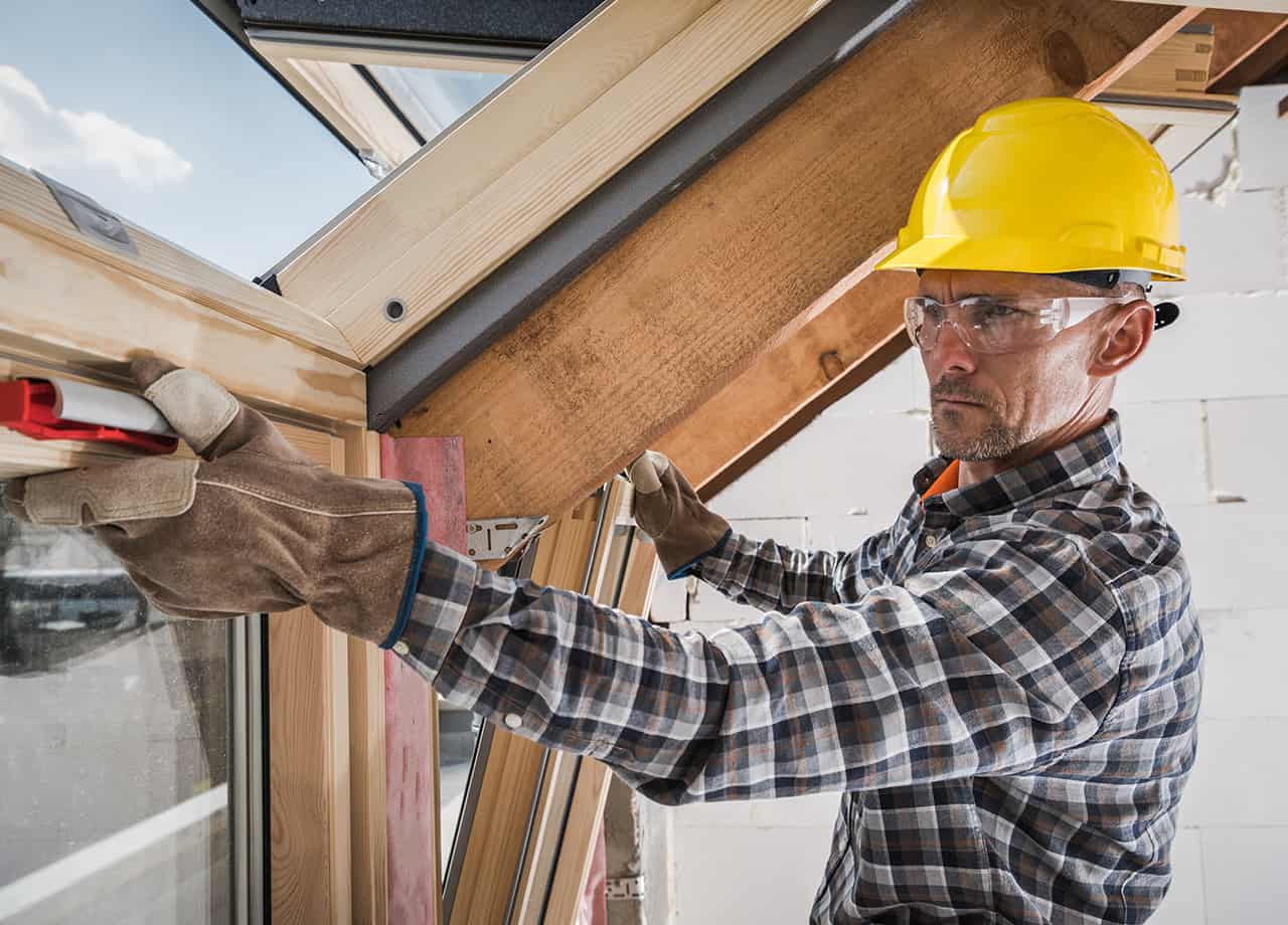 Roofing For Troops contractors repairing a skylight on a home in Cincinnati OH.