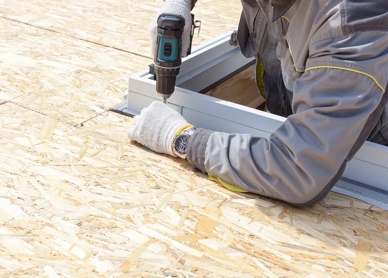 skylight replacement Milford OH _ Cincinnati OH Image of one of our roofing contractors in Milford OH & Cincinnati OH replacing a skylight on a home