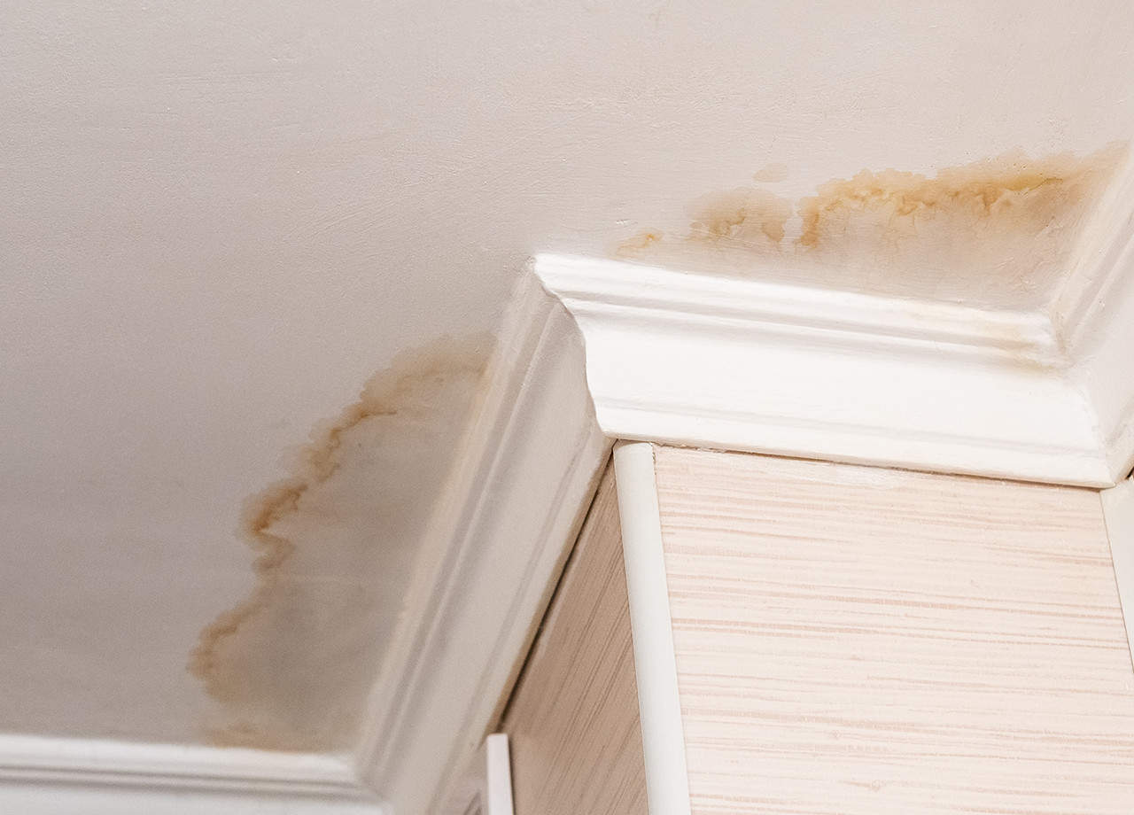 water stains on a ceiling from roof leaks Image of water stains on a ceiling in a home due to a roof leak. Our roofing contractors in Milford OH & Cincinnati OH can repair roof leaks for your home.