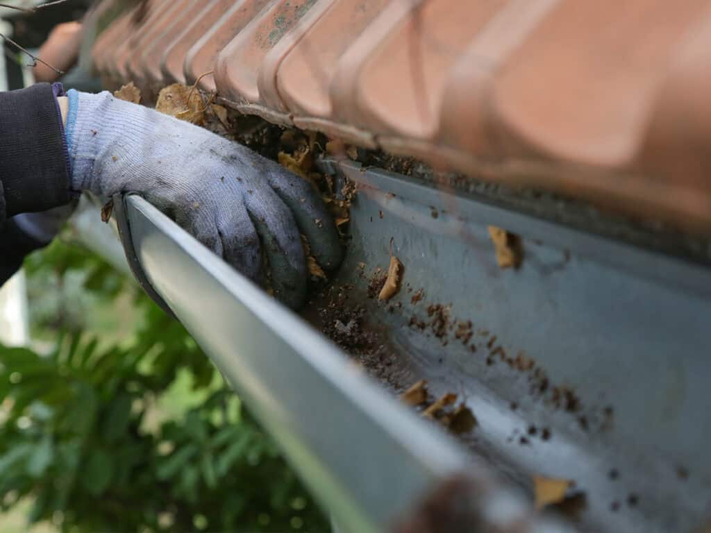 Gutter cleaning with roofing for troops