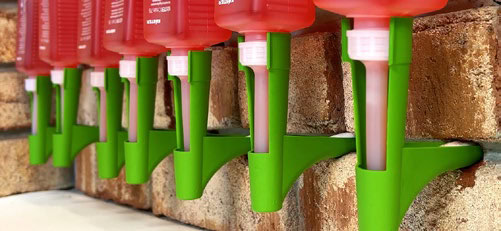 Colorful drip irrigation emitters for efficient water management in gardening and farming.