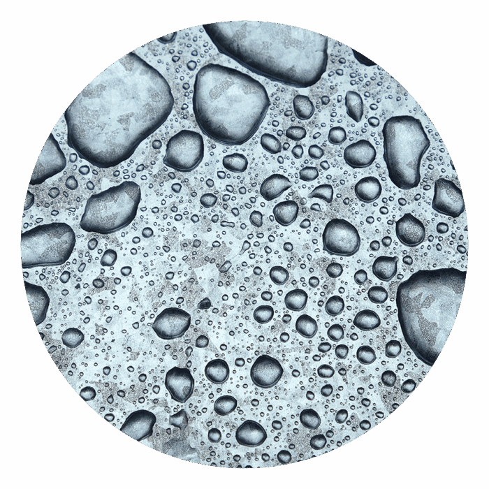 Water droplets on a rubber roof surface, showcasing waterproofing quality and durability.