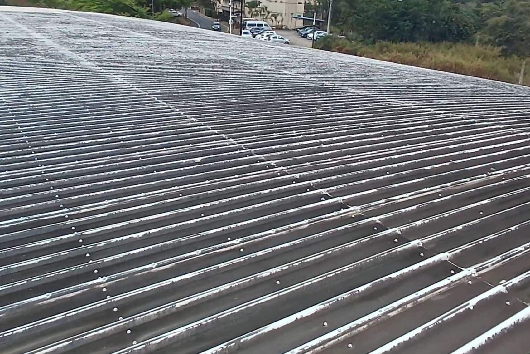 Rust-resistant rubber roofing sheets with water droplets for durability and weatherproof protection.