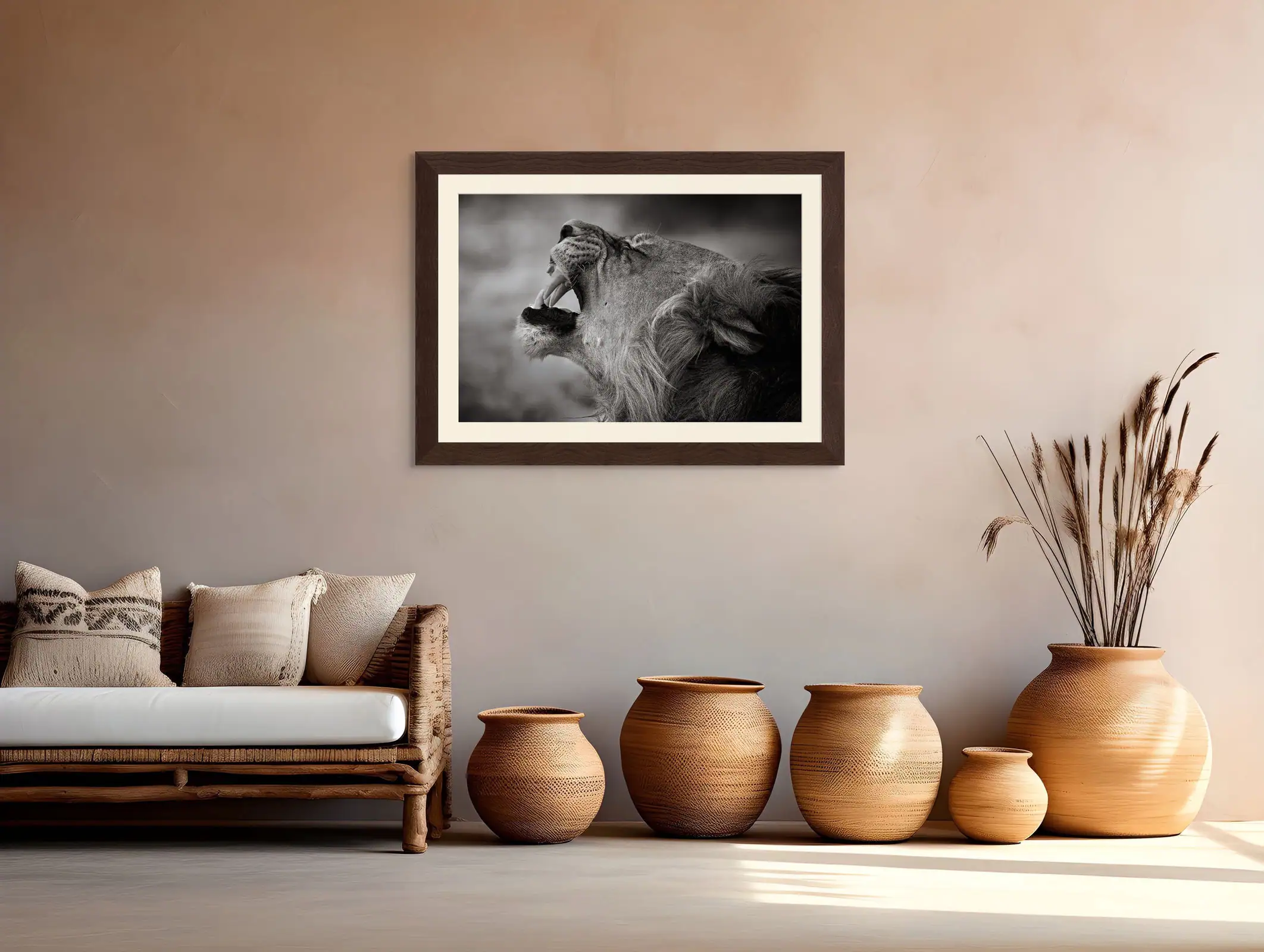 A top standard framed fine art black-and-white African Wildlife Photography Print pf a close-up portrait of a black-maned kalahari lion displaying a flehmen response.