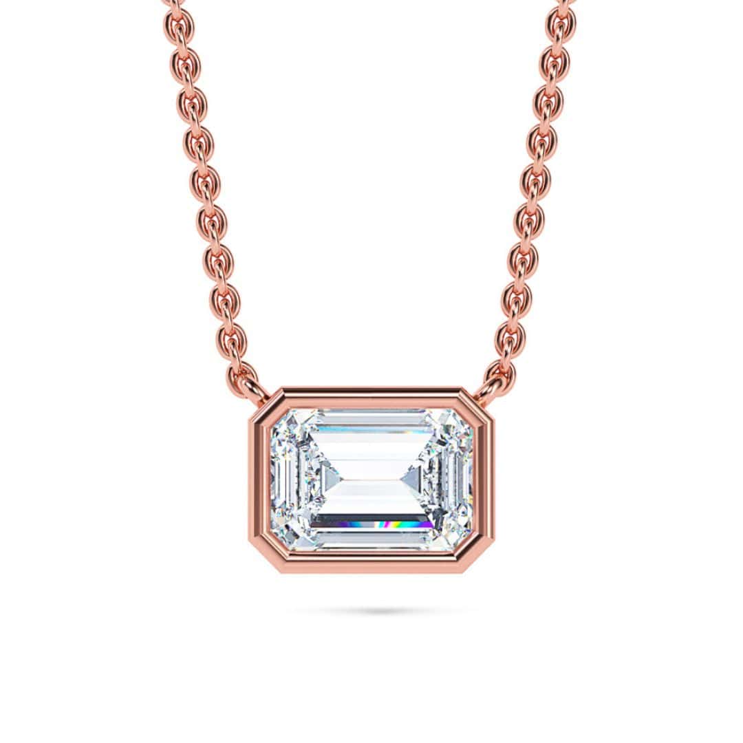 Cut diamond pendant on rose gold chain. Perfect for sophisticated jewelry lovers.