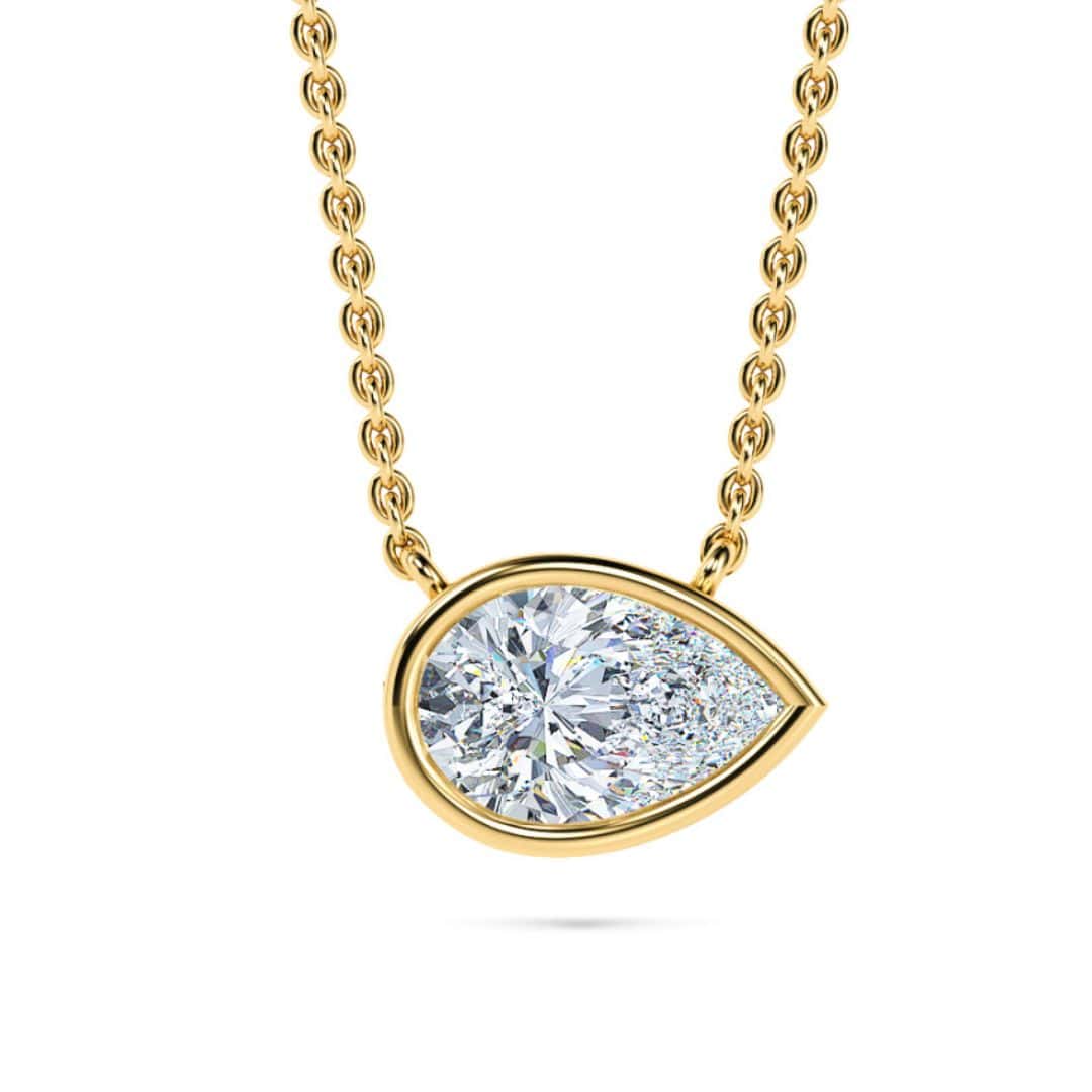 Shaped diamond pendant on a gold chain, perfect for sophisticated jewelry lovers.