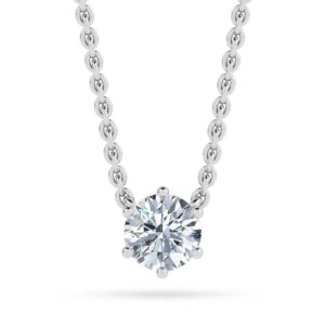 Elegant round solitaire diamond pendant on a fine chain, showcasing timeless jewelry craftsmanship.
