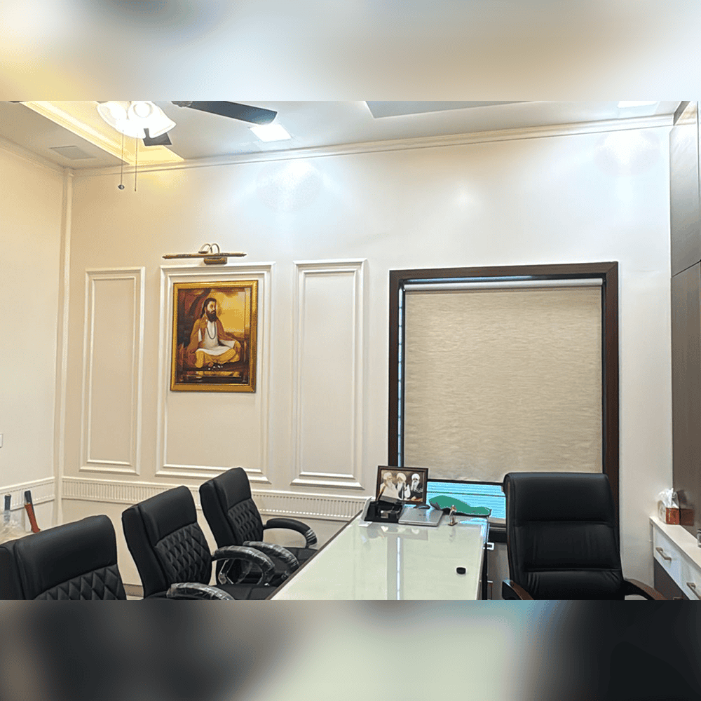 Premium office space with elegant decor and artwork, designed for productivity and comfort.