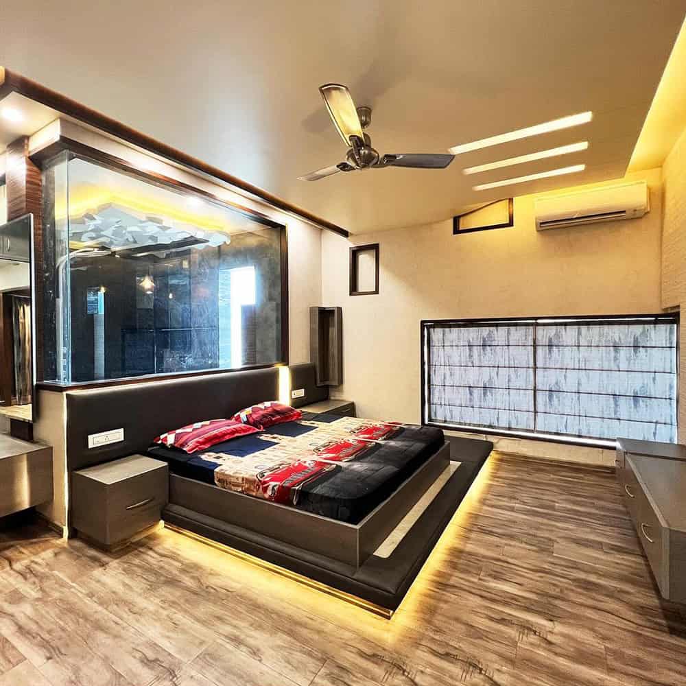 Modern bedroom design with sleek furniture and ambient lighting, part of Sak Designs x Space Bound collection.