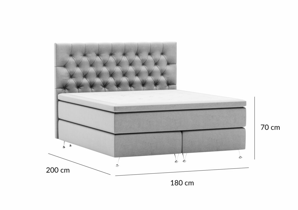 Elegant säng med tuftat huvudgavel och boxmadrass, perfekt för sovrum i modern stil.