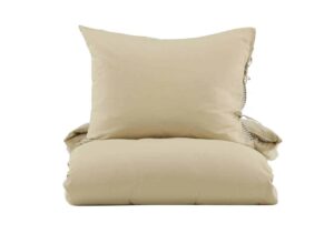 Mjukt sovrumskudde i beige med hög komfort och kvalitet.