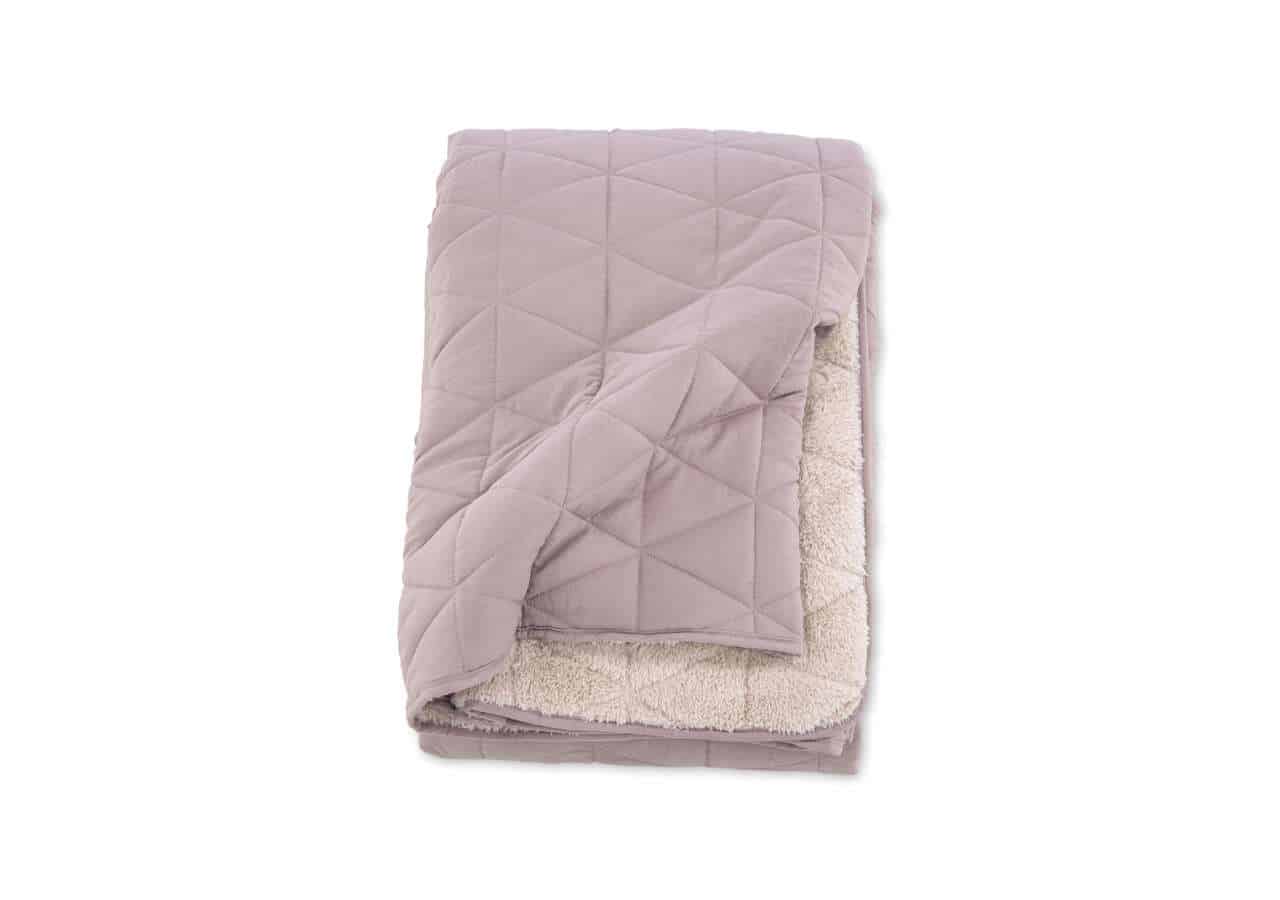 Madrasskydd i tyg, perfekt för en bekväm och skyddande sängkomfort.