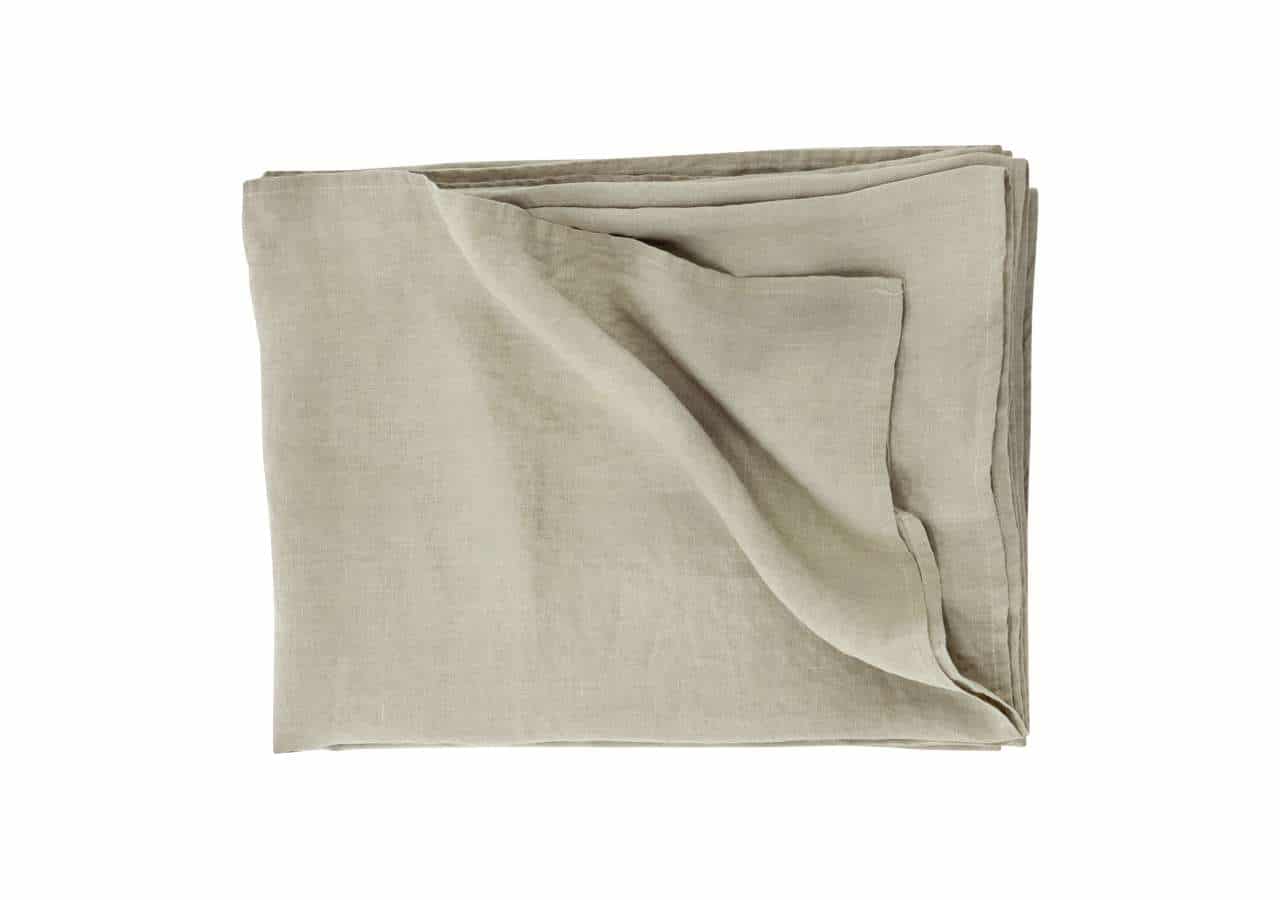 Linstickad linnesängklädsel för skandinavisk sovstil och komfort.