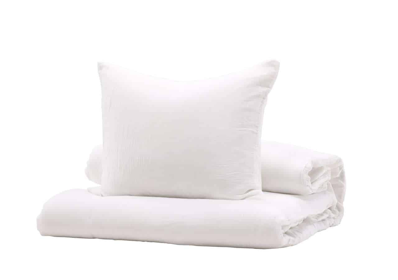 Långsamtorkad ullkudde och täcke för bättre sömn och komfort.