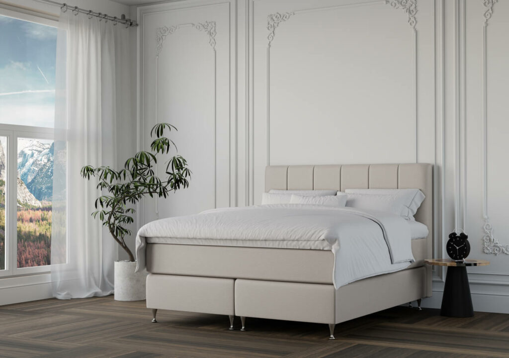 1. Säng i modern design med elegant takkant och bekvämt huvudgavel.