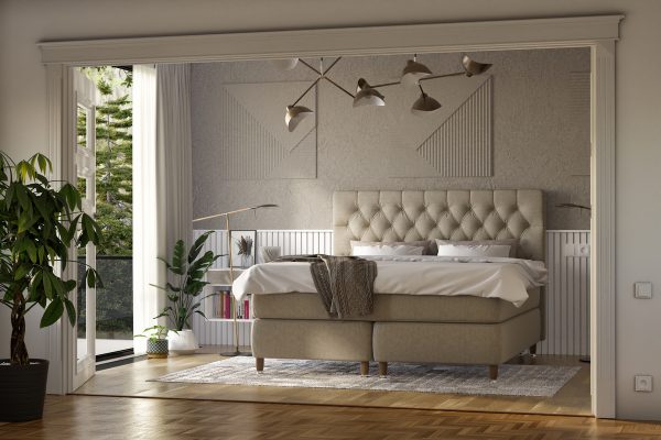 Lyxigt sovrum med vackert sänggavel och naturligt ljus, perfekt för vila och avkoppling.