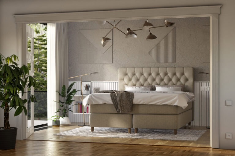 Lyxigt sovrum med vackert sänggavel och naturligt ljus, perfekt för vila och avkoppling.