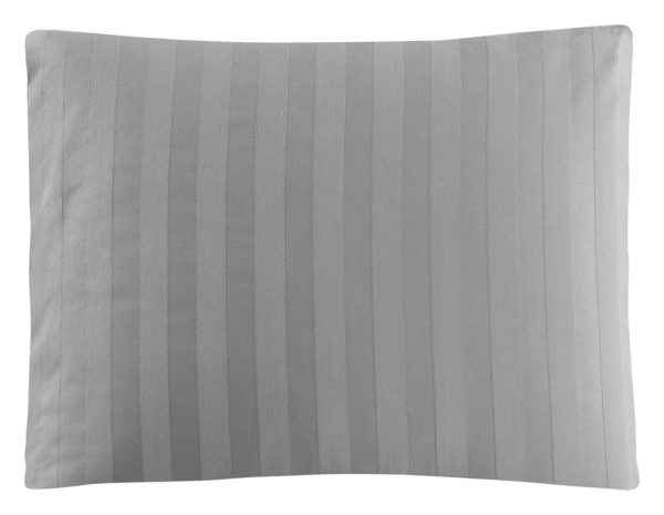 Ljusgrå sovkudde i linne för optimal sömn och komfort.