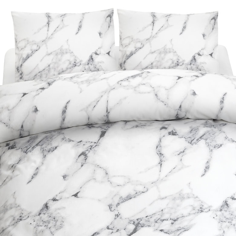 Elegant marmormönstrad sängkläder set för modern sovrum inredning.
