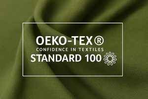 Oeko-Tex Standard 100 tygtextilblick med grönt material.
