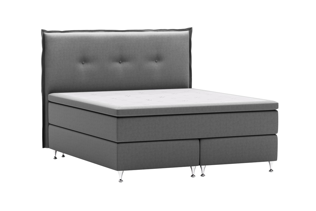 Elegant grå sänggavel med moderna metallben och bekväm madrass från Sängfabriken.