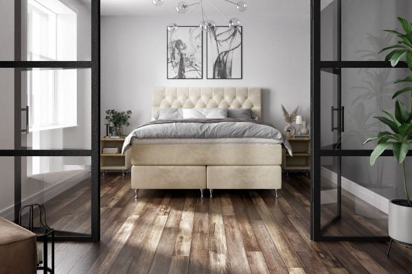 Ljus och modern säng i exklusiv sängfabrik i Stockholm.