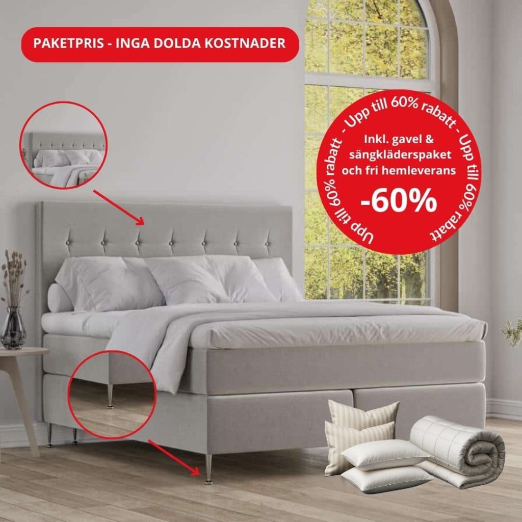 Säng i grått med sängkläder och dekorationer från Sängfabriken, inklusive extra sängkläder och bäddmadrass.