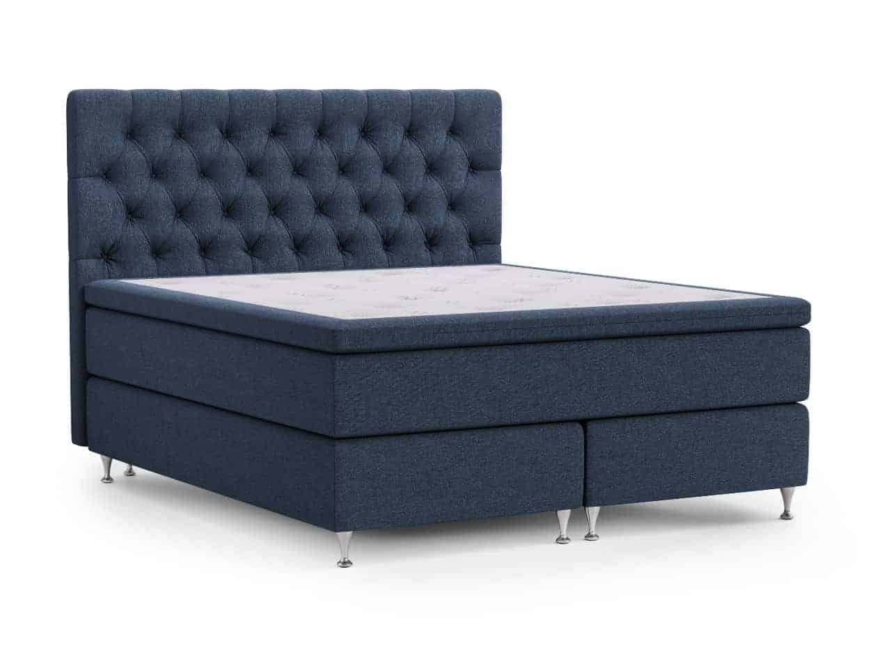 Sängfabriken Luxe. Elegant blå säng med tuftad huvudgavel för modern sovrumsmöbel.