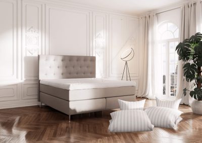 Modern och elegant säng i ett ljust, smakfullt sovrum med stora fönster och naturligt ljus.