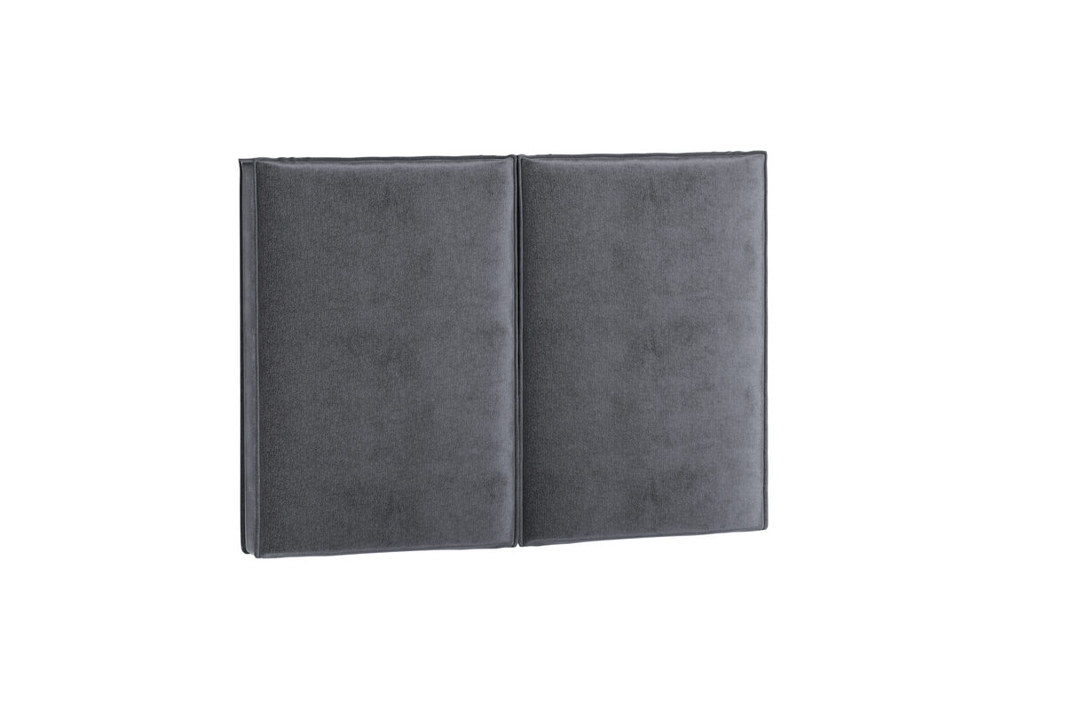 Sänggavel i elegant mörkgrå sammet för modern sovrumsinredning.