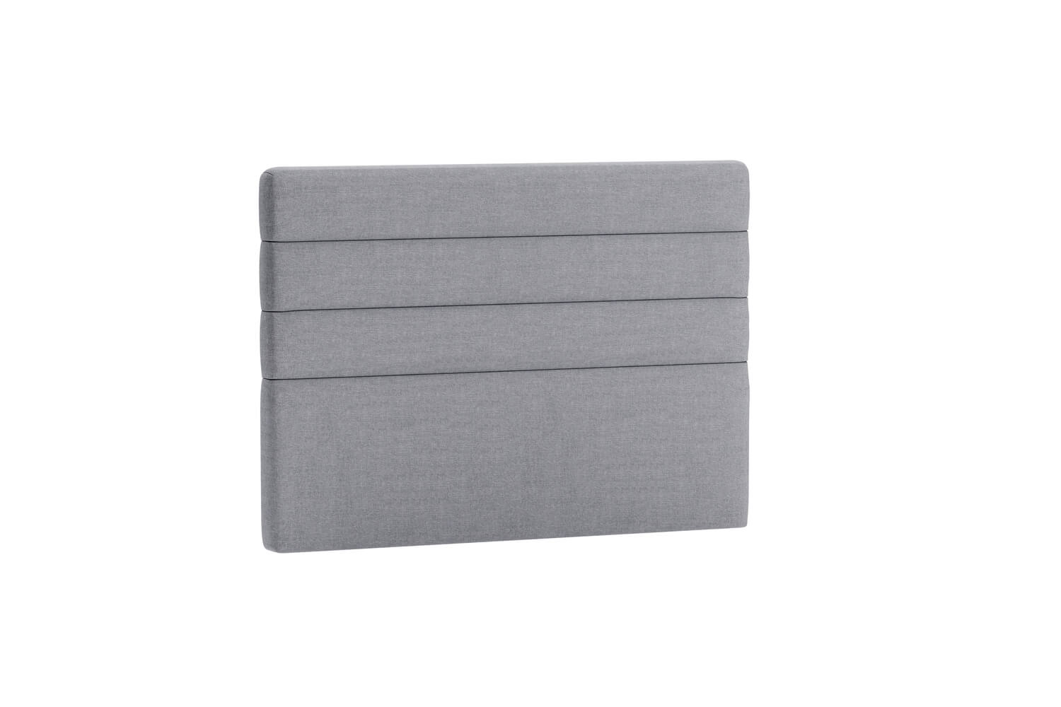 Sänggavel i grått tyg för modern sovrumsinredning.