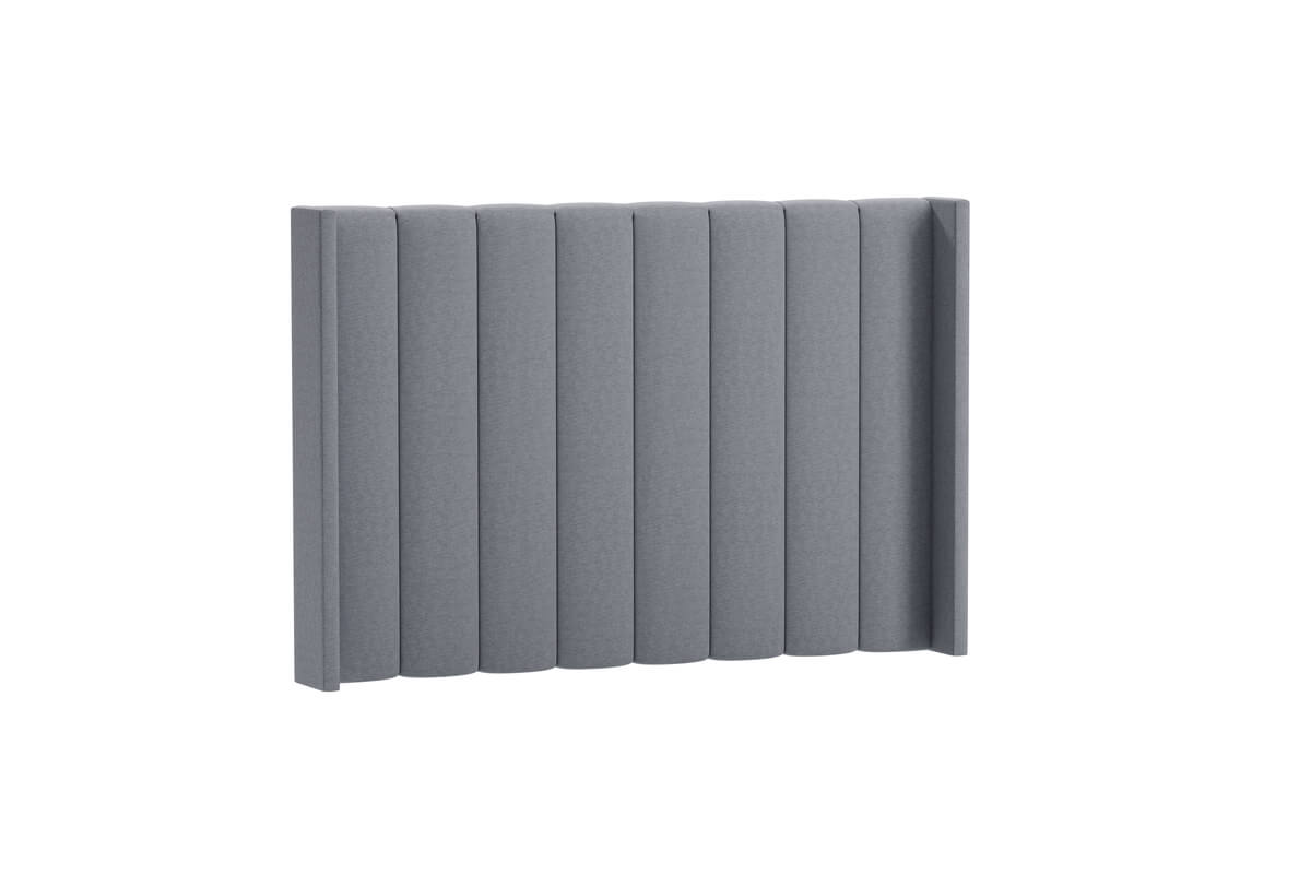 Sänggavel i grått tyg för modern sovrumsinredning.