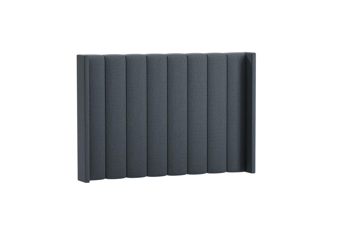 Sänggavel i mörkgrått tyg för modern sovrumsinredning.